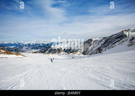 winter with ski slopes of kaprun resort next to kitzsteinhorn peak in austrian alps Stock Photo