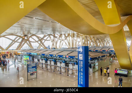 Kunming,China - April 22,2017:Traveler can seen exploring and walking around the Kunming Changshui International Airport. Stock Photo