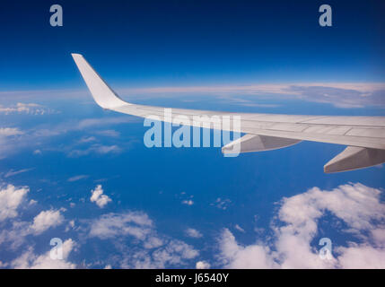 Airplane Wing in Flight Stock Photo