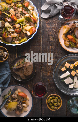 Serving with kasul, cheese, bread, olives, wine on the table free space Stock Photo