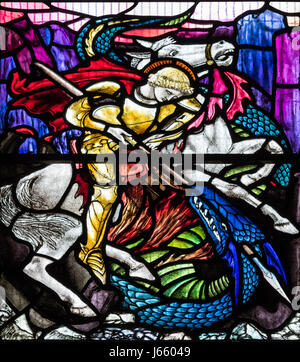 St. George slaying the dragon by Christopher Whall, St. Peter's Church, Norton on Derwent, North Yorkshire, England, UK Stock Photo