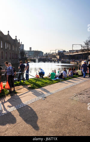 People strolling, meeting and socialising by Regent's Canal at Camden Lock, London, UK Stock Photo