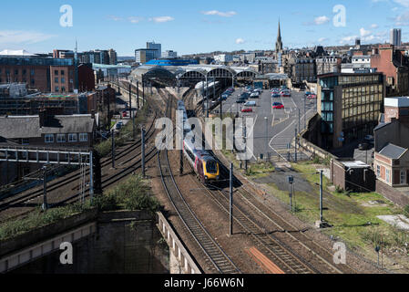 TransPennine Express train heading north bound on departure from Newcastle upon Tyne Central Station, England. Stock Photo