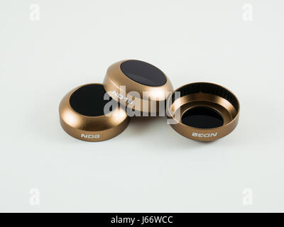 Three Neutral Density filter displayed in density order with the last filter inverted to see the inside Stock Photo