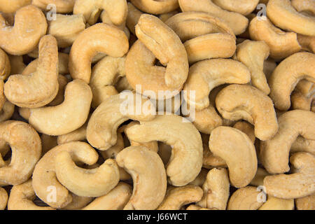 close up of salted cashews in a pile Stock Photo