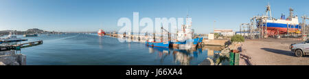 SALDANHA BAY, SOUTH AFRICA - APRIL 1, 2017: A panorama of the harbor in Saldanha Bay, a town in the Western Cape Province Stock Photo