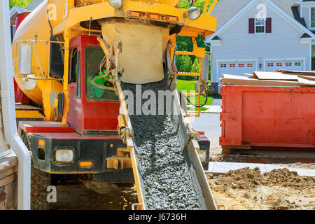 Wheelbarrow with shovel full of cement Concrete wheelbarrow Stock Photo