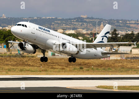 Aegean Airlines Airbus A320-232 [SX-DGV] taking off runway 13, operating instead of the normal Olympic Bombardier DHC-8 to Athens. Stock Photo