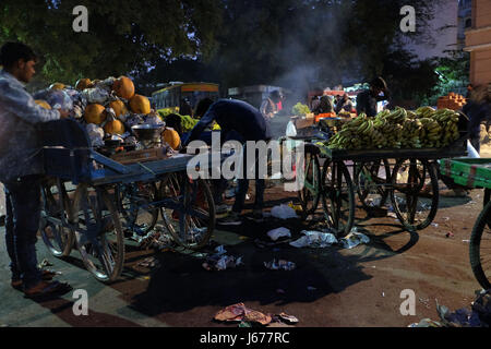 Seller at the vegetable night market in Jaipur, Rajasthan, India on February, 15, 2016. Stock Photo