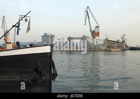 industry industrial plant harbor work factory harbours antwerp sailing boat Stock Photo