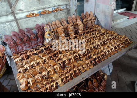 Display of traditional shoes at the street market in Kolkata, India on February 09, 2016. Stock Photo