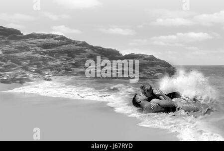 FROM HERE TO ETERNITY 1953 Columbia film with Burt Lancaster and Deborah Kerr on the beach at Haluna Cove, Diamond Head, O'ahu, Hawaii. Stock Photo