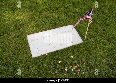 edward moore ted teddy kennedy grave with coins arlington cemetery Washington DC USA Stock Photo