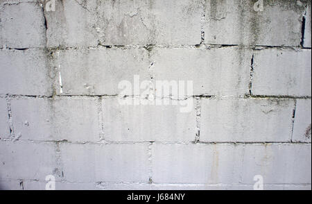 View at wall made ouf of concrete blocks Stock Photo
