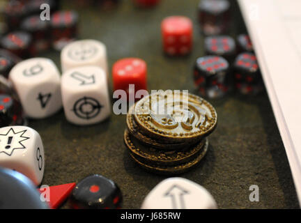Game pieces for tabletop strategy games sit on a table at Gigabites Café in Marietta, Georgia. Stock Photo