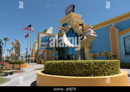 Sand sculptures and Ron Jon's famous surf shop on Coacoa Beach Florida USA Stock Photo