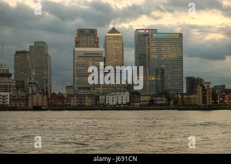 London, UK. 19th May 2017.  Clouds over Canary Wharf business district.   Credit: claire doherty/Alamy Live News Stock Photo