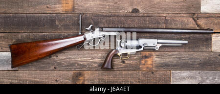 Antique American Civil War era rifle and pistols made from 1847-1863. Stock Photo