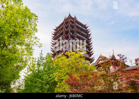 Meishan, Sichuan Province, China - Apr 29, 2017: YuanJingLou building against blue sky and white clouds Stock Photo
