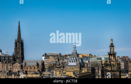 Edinburgh Old Town rooftop skyline, with EIF headquarters The Hub spire, Royal Mile, Scotland, UK against blue sky