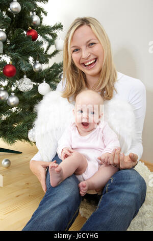 wing baby angel angels mother mom ma mommy mothers christmas tree laugh laughs Stock Photo