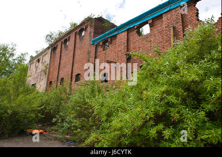 Derelict brick built factory warehouse in Newport, South Wales, UK Stock Photo