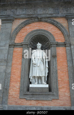 Marble statue of Carlo I d'Angio  site on Plebiscito's Square on the facade of Royal Palace in Naples Stock Photo