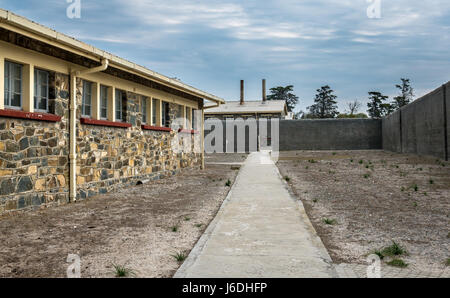 Cell block at Robben Island museum, Cape Town, South Africa, and exercise yard area Stock Photo
