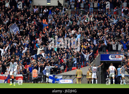 Millwall's Steve Morison celebrates scoring his side's first goal of the game in front of the fans during the Sky Bet League One play off final at Wembley Stadium, London. Stock Photo