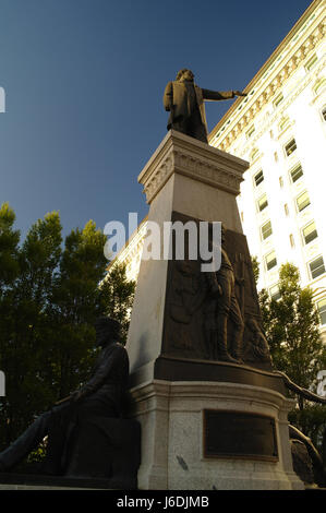 Blue sky portrait south side Brigham Young Monument, to Joseph Smith Memorial Building, Main Street at South Temple Street, Salt Lake City, Utah, USA Stock Photo