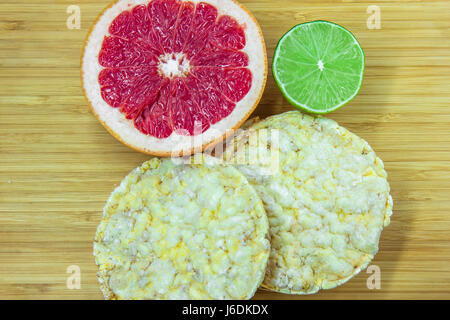 Rice cakes and citrus Stock Photo