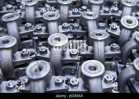 Industrial background from part of assembled valves Stock Photo