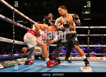 Liam Walsh (left) and Gervonta Davis during the IBF Super-Featherweight Championship bout at The Copper Box, London. Stock Photo