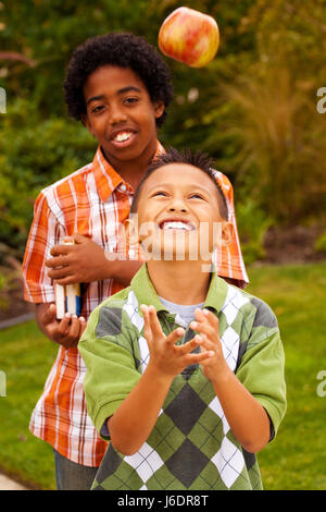 Happy young kids smiling and laughing. Stock Photo