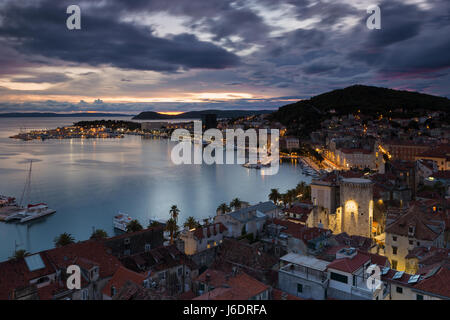 Elevated view on town Split in the evening blue hour, Croatia Stock Photo