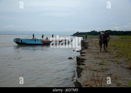 Riverbank damages due to river erosion from the Padma River at Ghior in Manikganj, Bangladesh Stock Photo