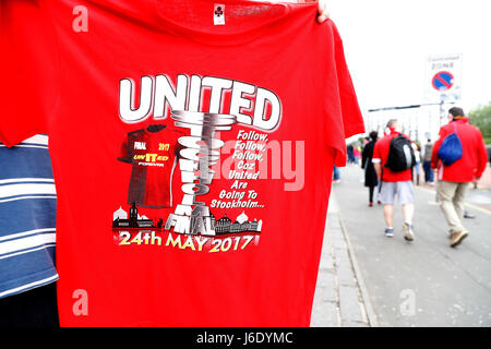 Europa League final t-shirts between Manchester United and Ajax in Stockholm on sale outside the ground before the Premier League match at Old Trafford, Manchester.