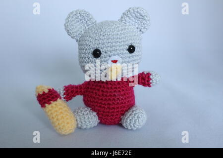 Woolen toy made in crochet and hand on white background Stock Photo