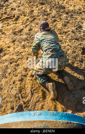 Infantry Trainee A trainee from the Army Physical Training Corps demonstrates scaling ...