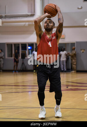 Lonnie Perrin, a member of the 1st Special Operations Medical Group basketball team, shoots a free throw during the intramural basketball championship at the Aderholt Fitness Center on Hurlburt Field, Fla., April 6, 2017. For eight weeks, 12 teams competing through a single-elimination tournament to qualify for the championship game. (U.S. Air Force photo by Airman 1st Class Joseph Pick) Stock Photo