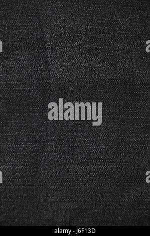 Background- black faded denim fabric Stock Photo