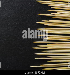 Toothpick on a black background. Not an even number. Stock Photo