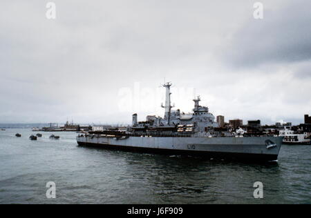 AJAXNETPHOTO. 6TH APRIL, 1982. PORTSMOUTH, ENGLAND. - HMS FEARLESS DEPARTS PORTSMOUTH FOR THE FALKLAND ISLANDS FOLLOWED BY HER FLOTILLA OF LANDING CRAFT. PHOTO:JONATHAN EASTLAND/AJAX REF:909362 Stock Photo