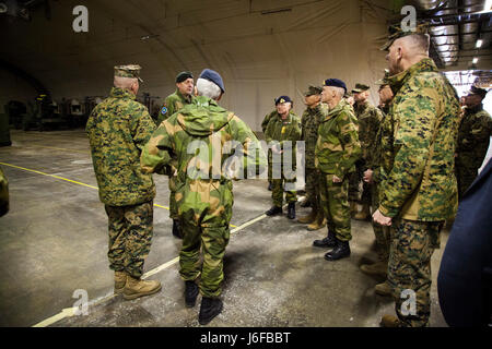 Capt. Ola Gilberg, Frigaard Cave Manager, gives U.S. Marines and Norwegians a tour of a cave site in Norway, May 9, 2017. Senior leaders visited the site to see the layout of the Marine Corps Prepositioning Program Norway (MCPP-N). MCPP-N increases the responsiveness of global expeditionary operations. (U.S. Marine Corps photo by Cpl. Emily Dorumsgaard) Stock Photo