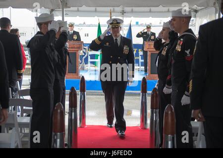 Cmdr. Carl Trask from Glendora California is rung ashore for