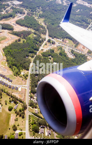 Atlanta Georgia,Hartsfield Jackson Atlanta International Airport,Delta Airlines,Air Lines,jet engine,wing,aerial overhead view from above,ground,throu Stock Photo