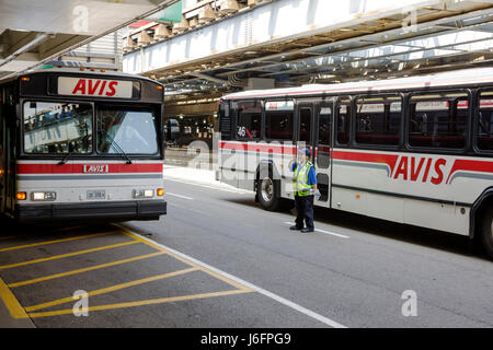 Chicago Illinois,ORD,O'Hare International Airport,Traffic Management Authority,woman female women,Avis rental car shuttle,bus,coach,public safety,woma Stock Photo