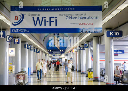 Chicago Illinois,O'Hare International Airport,passenger passengers rider riders,gate,wi fi,banner,wireless internet,hot spot,service,IL080722003 Stock Photo