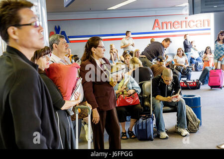 Illinois,IL,Upper Midwest,Prairie State,Land of Lincoln,Chicago,O'Hare International Airport,American Airlines,flight,gate,passenger passengers rider Stock Photo