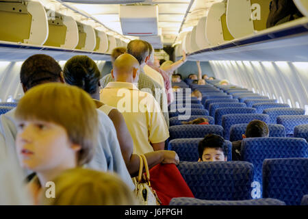 Illinois,IL,Upper Midwest,Prairie State,Land of Lincoln,Chicago,O'Hare International Airport,American Airlines,jet aisle,overhead compartment,seats,bo Stock Photo